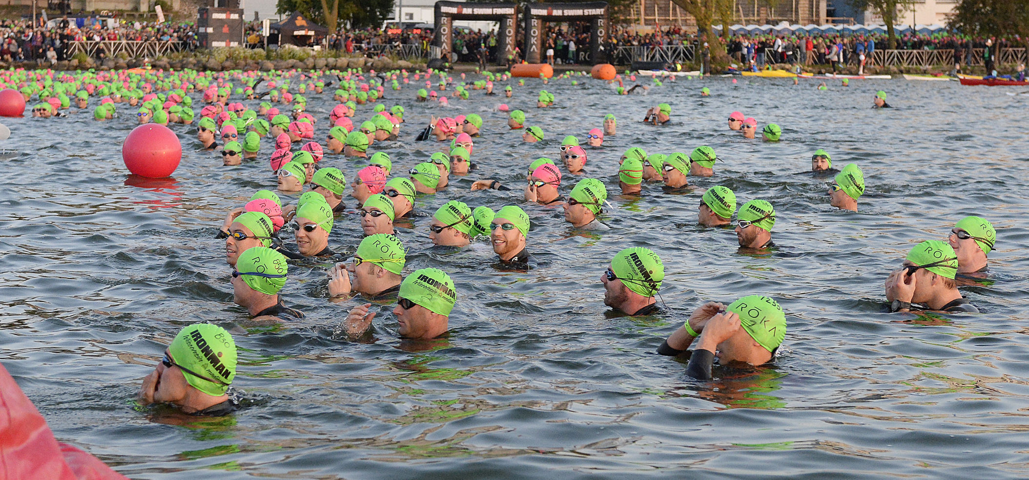 First group of men wait for start of swim leg